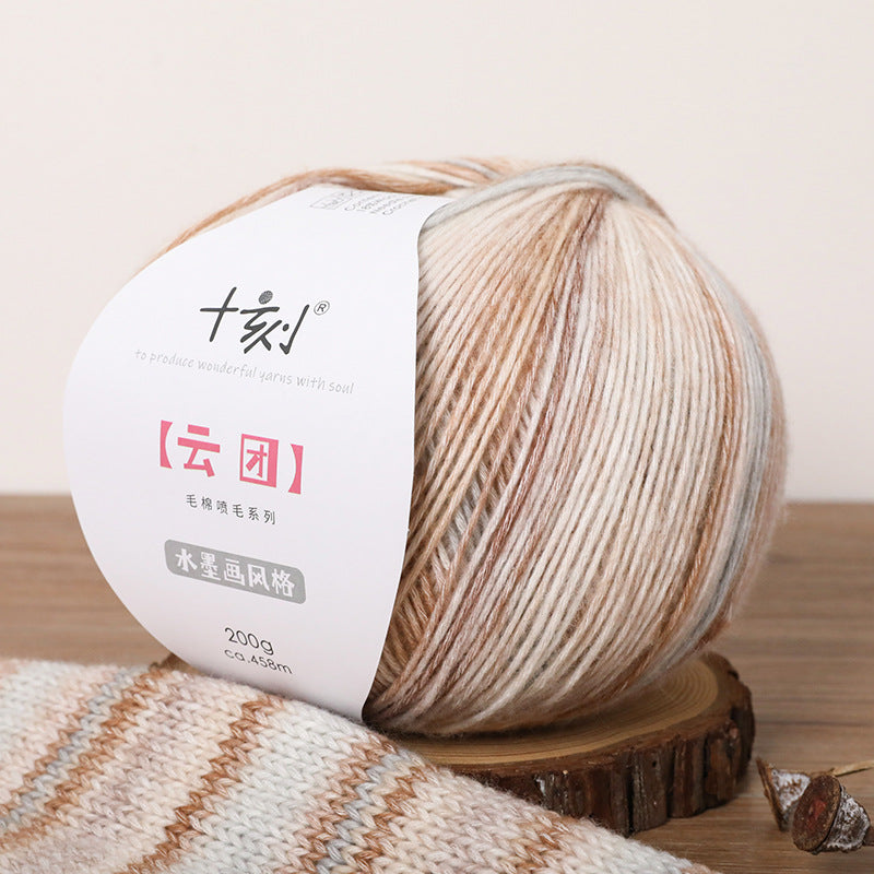Ball of yarn with a label on a wooden surface