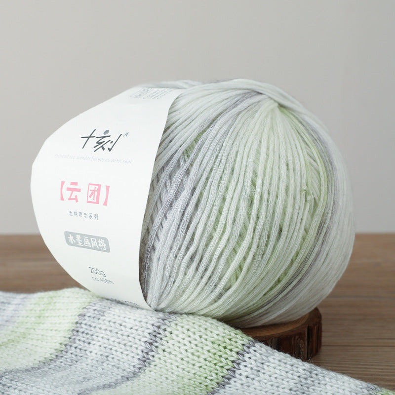 Ball of yarn with a label on a wooden surface