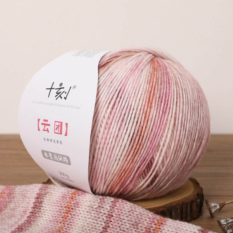 Ball of yarn with a label on a wooden surface