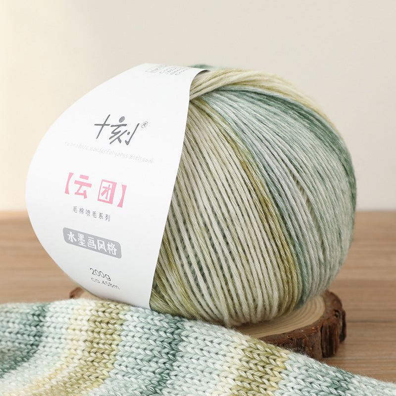 Ball of yarn with a label on a wooden surface