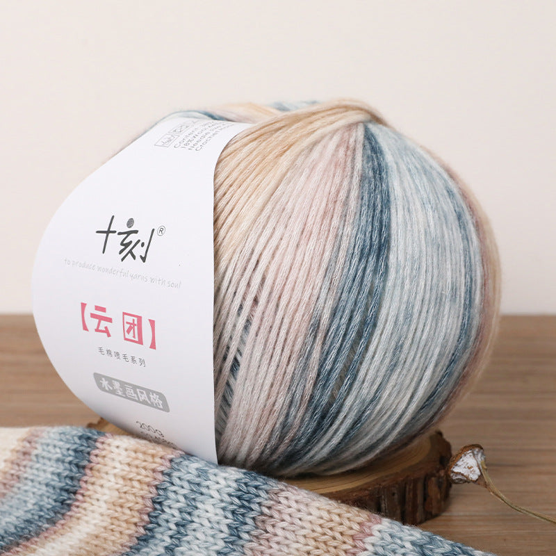 Ball of yarn with a label on a wooden surface