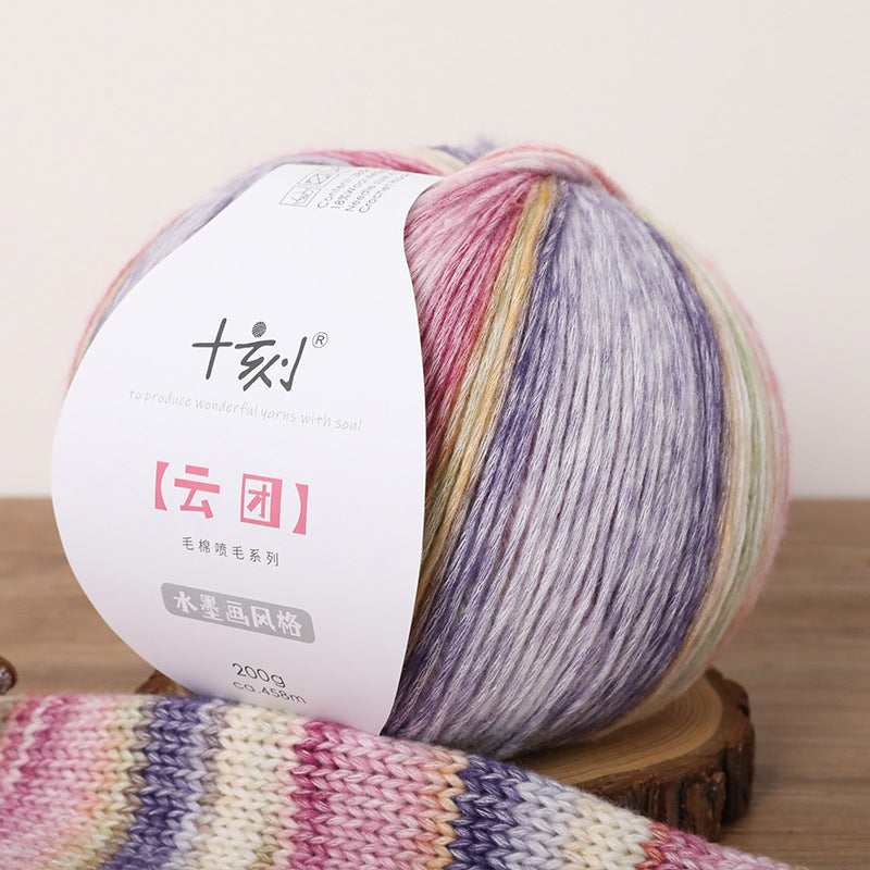 Multicolored yarn ball with a label on a wooden stand
