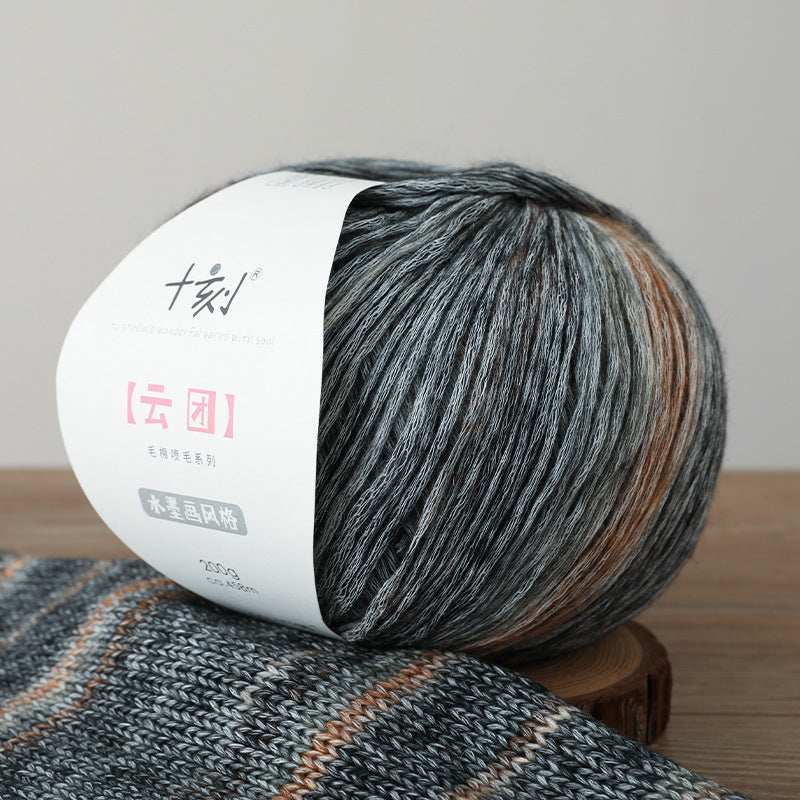 cotton blend yarn for knitting projects  on a knitted fabric background