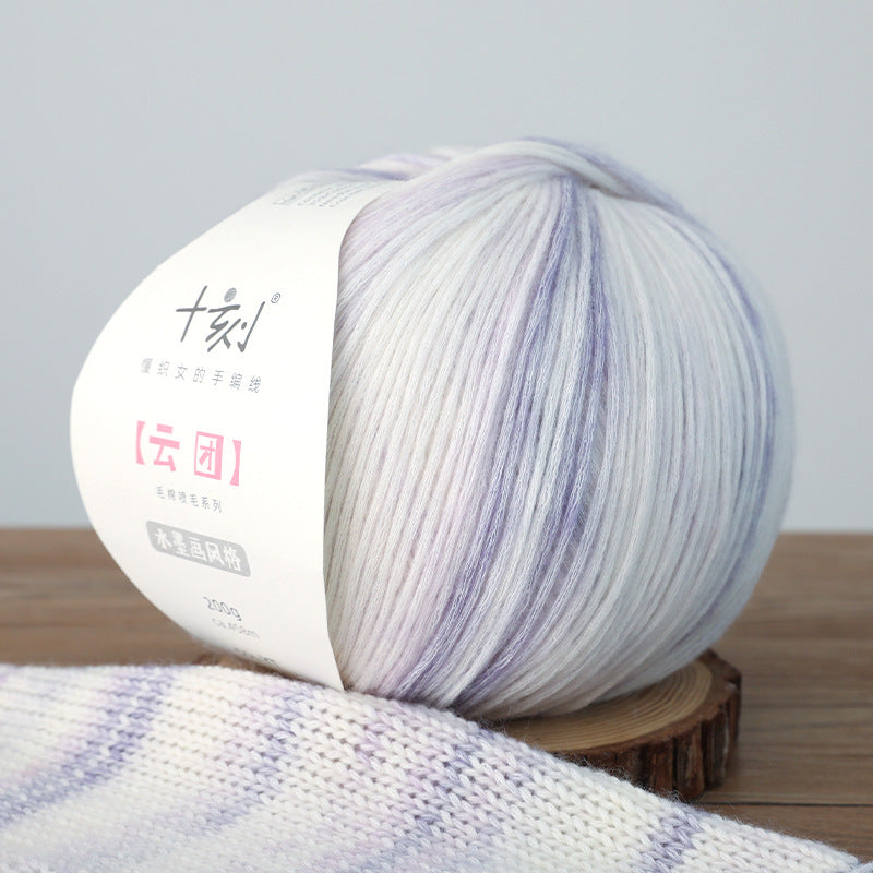 Ball of yarn with a label on a wooden surface