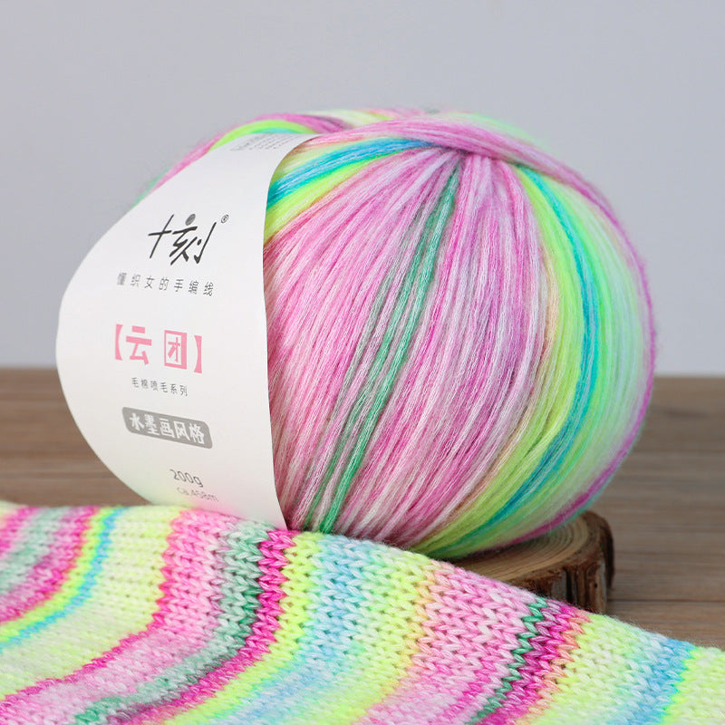 Colorful skein of yarn with a label on a wooden surface