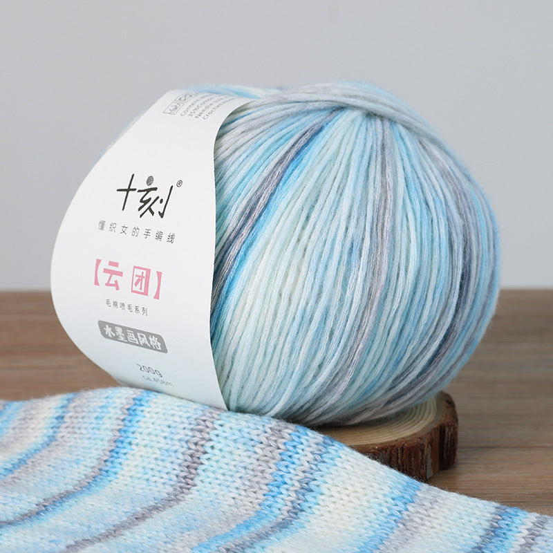Ball of yarn with a label on a wooden surface