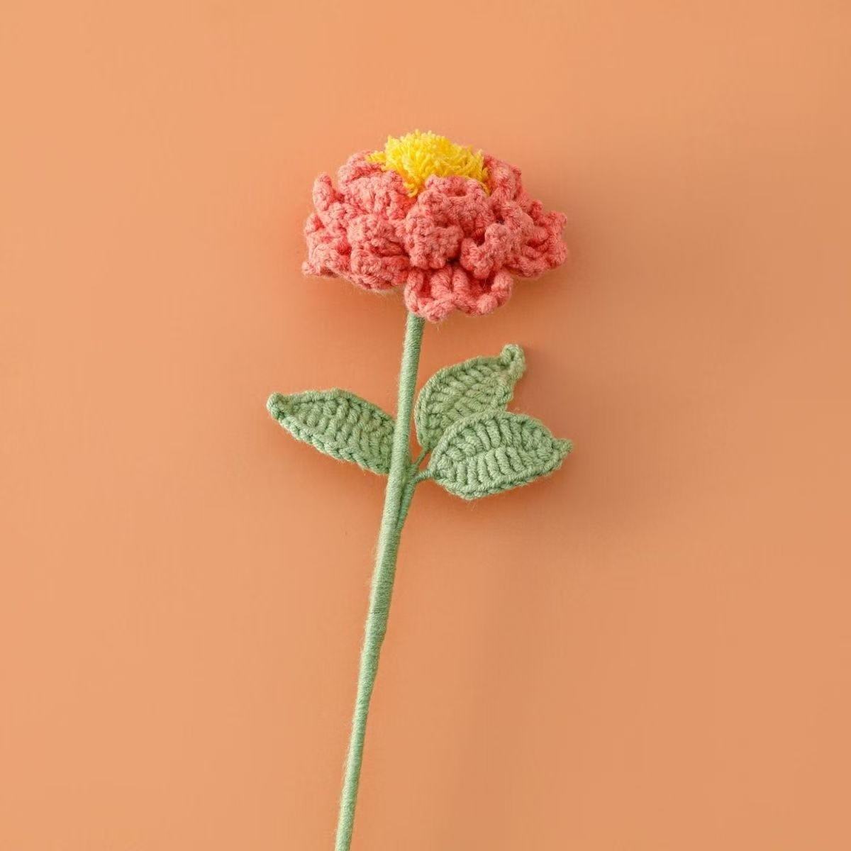 Handmade crochet peony flower in orange with yellow centre – soft yarn floral stem for UK home décor or gifting