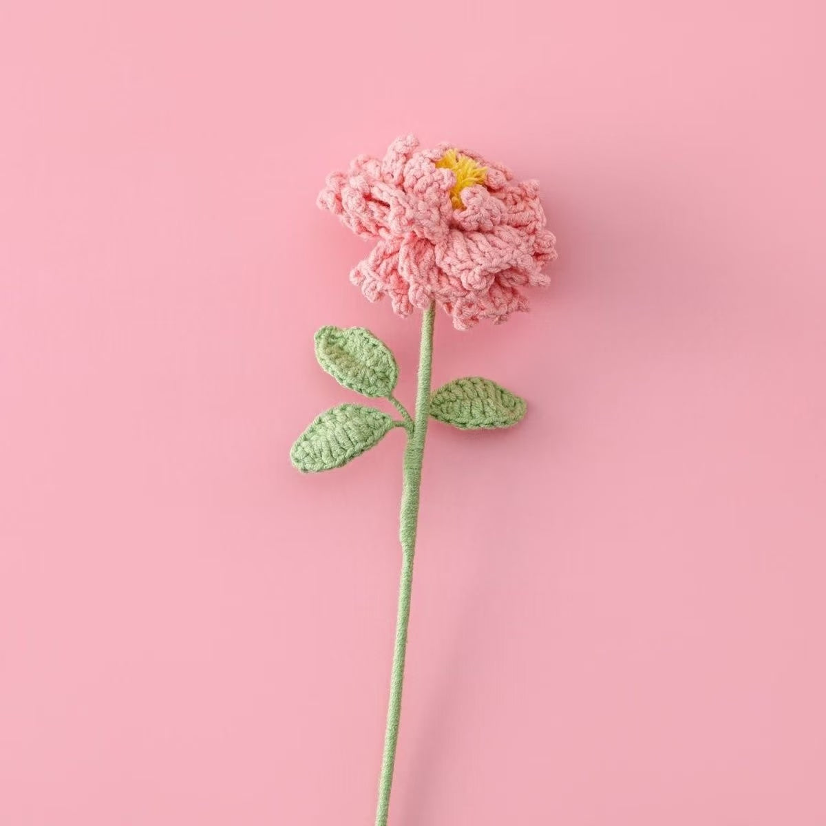 Handmade crochet peony flower in pink with yellow centre – soft yarn floral stem for UK home décor or gifting