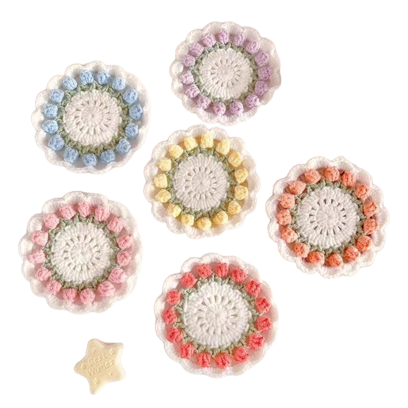 Set of six colorful crocheted coasters on a white background