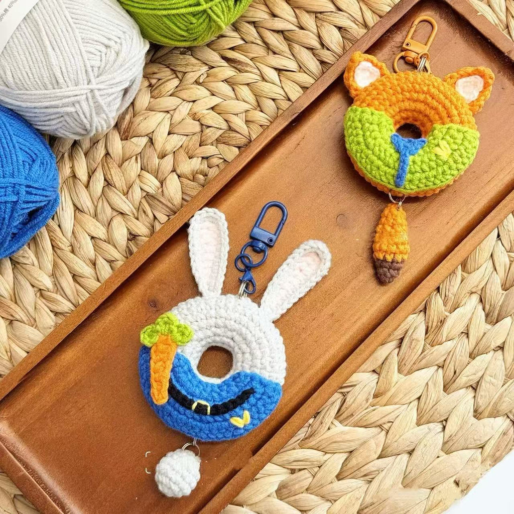 Zootopia crochet keychain kit featuring Judy Hopps bunny and Nick Wilde fox, DIY handmade crochet animal keyring kit with yarn and accessories