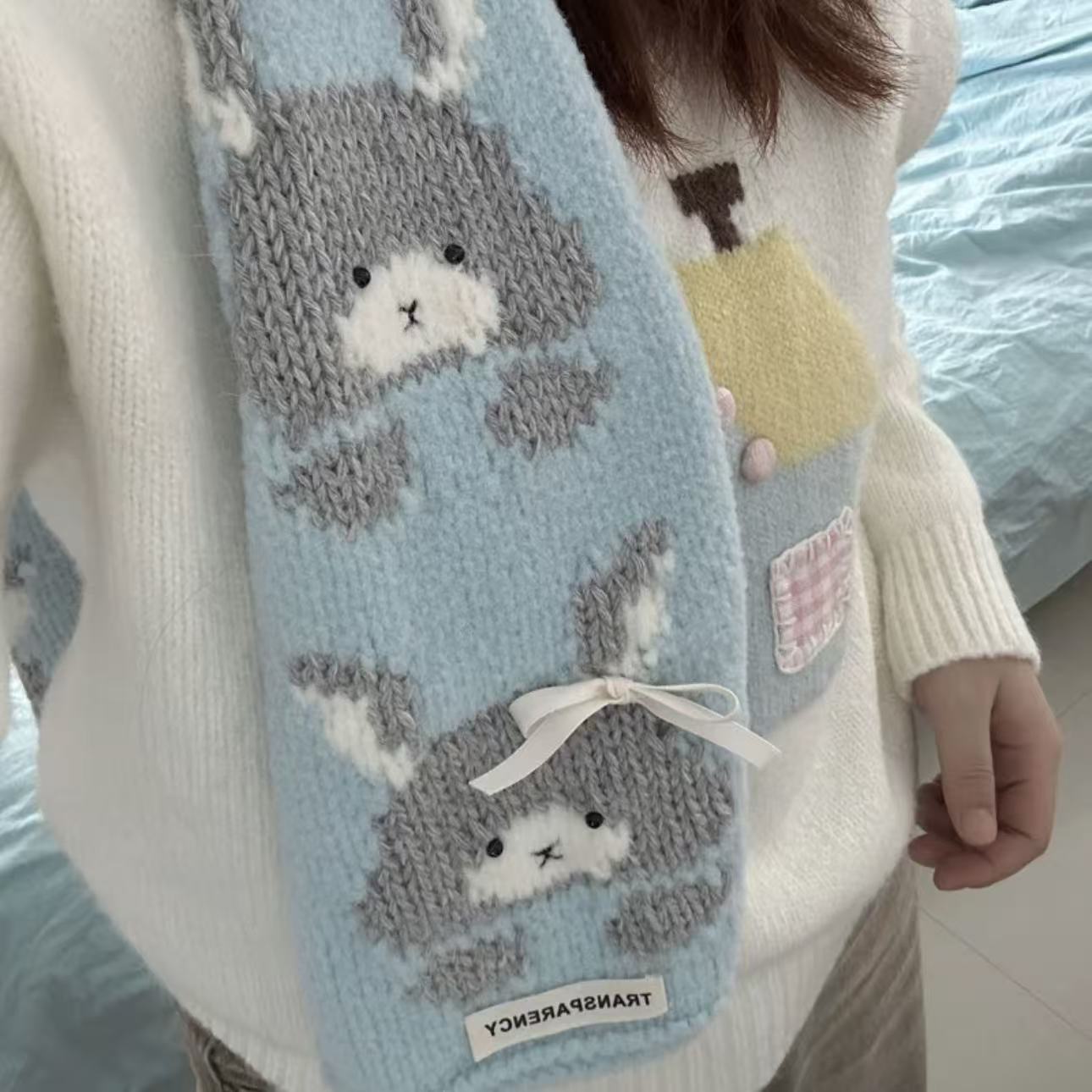 Handmade knitting cat pattern scarf kit with blue yarn, knitting needles and cute kitten design, beginner-friendly knitting kit for cosy winter accessories
