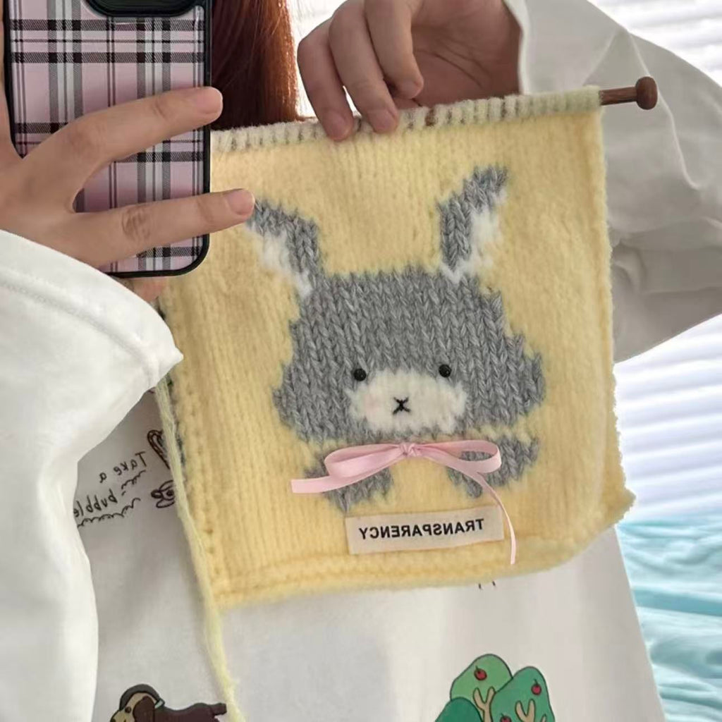 Handmade knitting cat pattern scarf kit with yellow yarn, knitting needles and cute kitten design, beginner-friendly knitting kit for cosy winter accessories