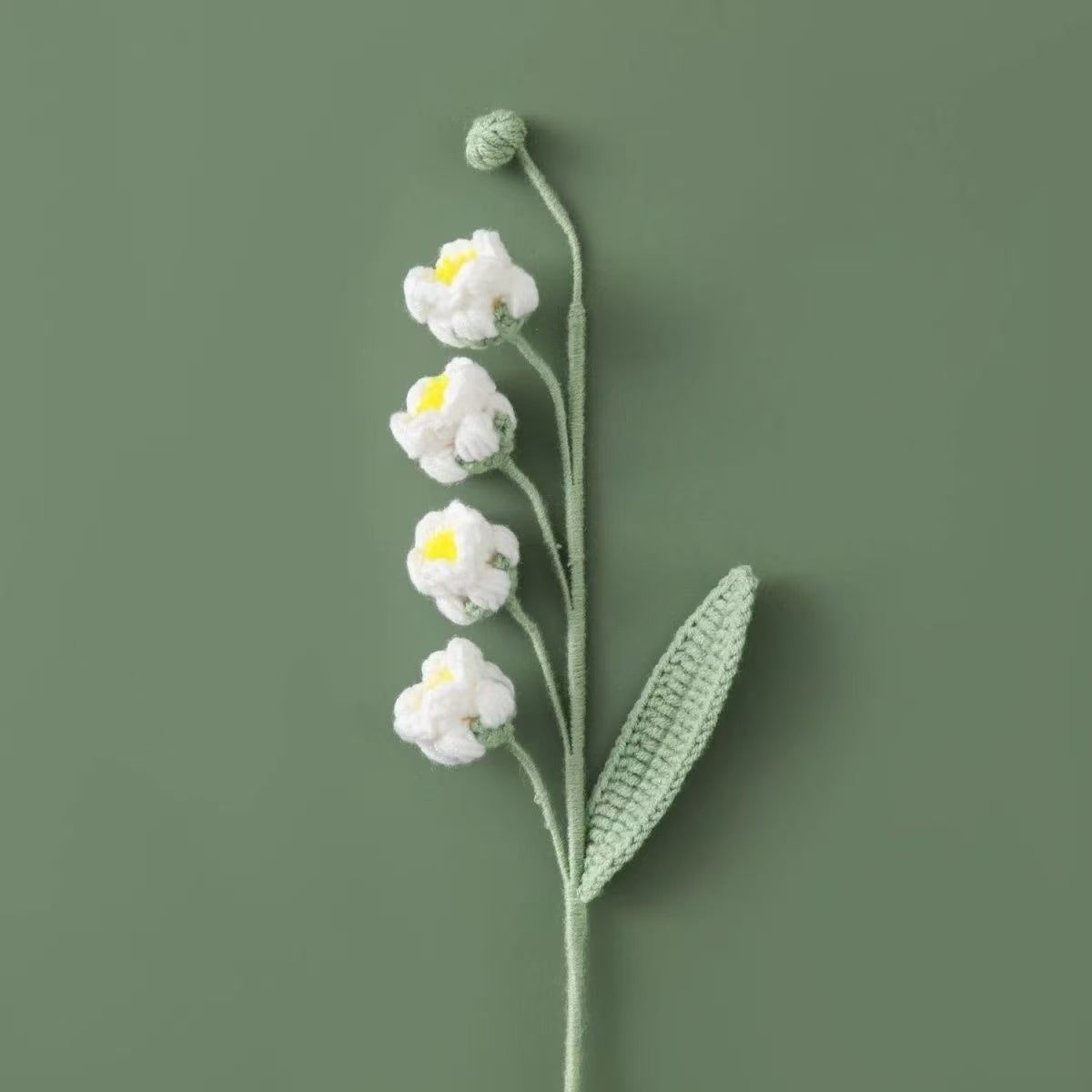 Handmade crochet Lily of the Valley puff flower stem with white blossoms and green leaf – eco-friendly knitted floral home decoration UK